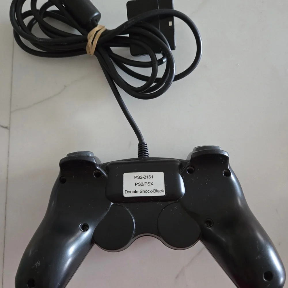 Sony PlayStation 2 Dual Shock Analog Controllers - One Sony‎ And One Unbranded
